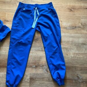 Great condition women’s royal blue Figs scrubs size medium